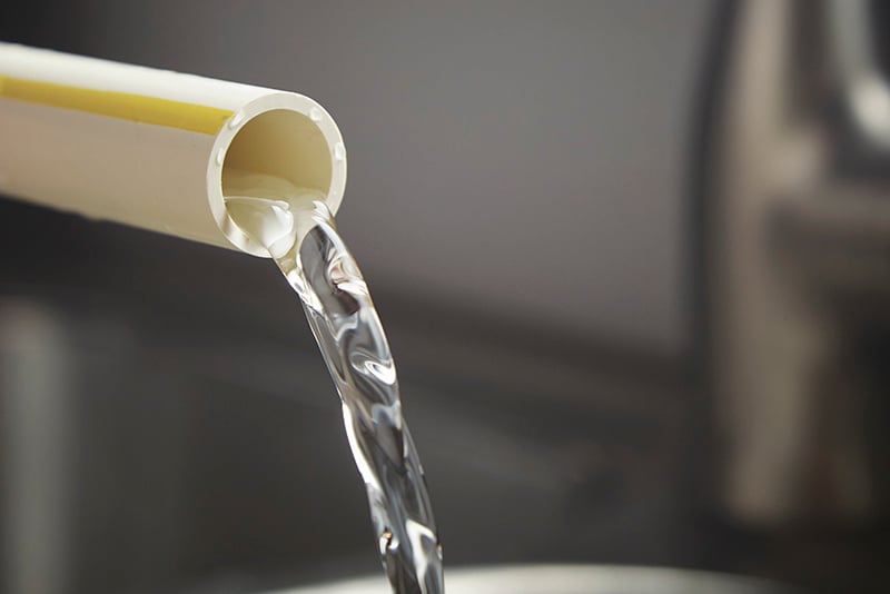 clean water flowing from FlowGuard Gold CPVC pipe